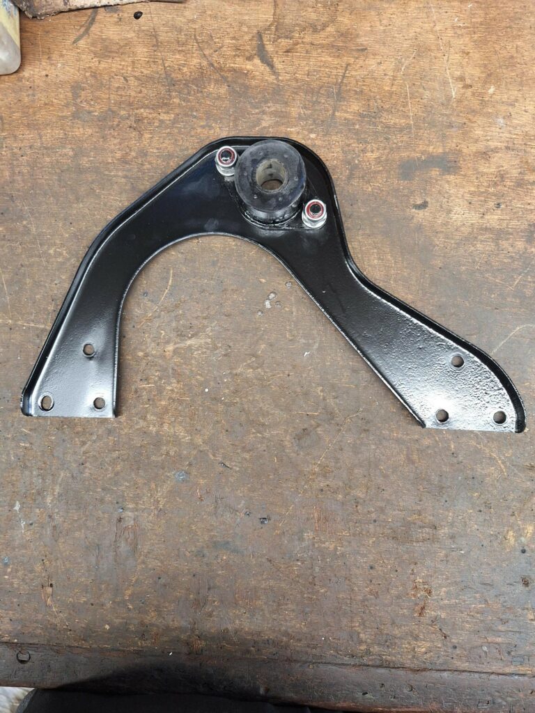 Front engine mount support bracket painted with new engine mount and BSF Nylocs fitted.