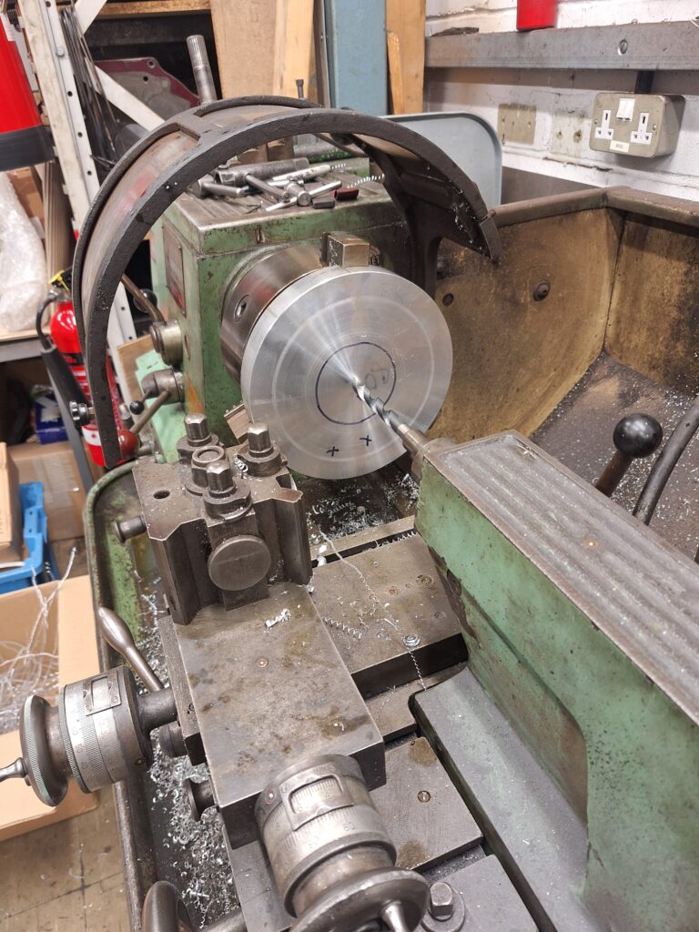 Finding centre with pilot drill