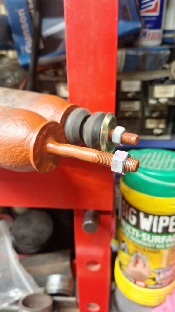 Welded new bolts to shocks to allow reuse.