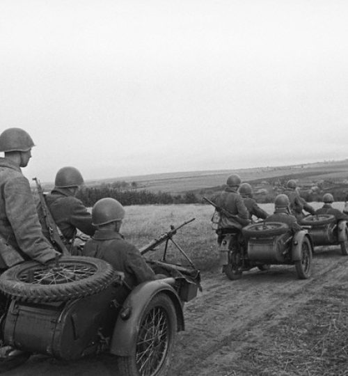 ca. 1943-1945, USSR --- Soviet troops on motorcycles under command of Battalion Commissar E. Khaimov. --- Image by © The Dmitri Baltermants Collection/CORBIS