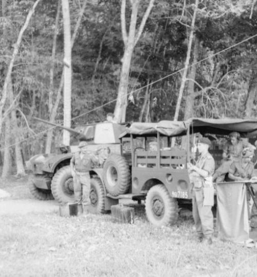 THE MALAYAN EMERGENCY 1948-1960 (MAL 246) A Royal Artillery mobile battery command post set up under the protection of a Ferret armoured car during a 'cordon and search' operation. Members of the Royal Corps of Signals pass messages between the units in the field conducting the operation and the command post. Copyright: © IWM. Original Source: http://www.iwm.org.uk/collections/item/object/205212406