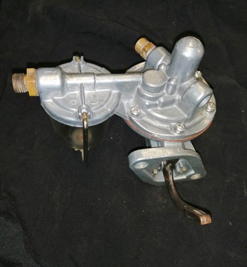 Replacement fuel pump with original pipe unions and leaver.