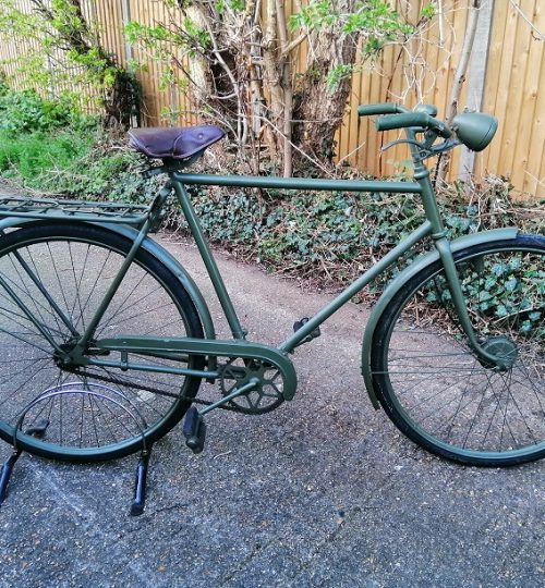 Leather saddle and rear brake activated by peddling backwards.